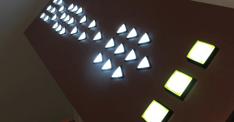 A console with many glowing buttons