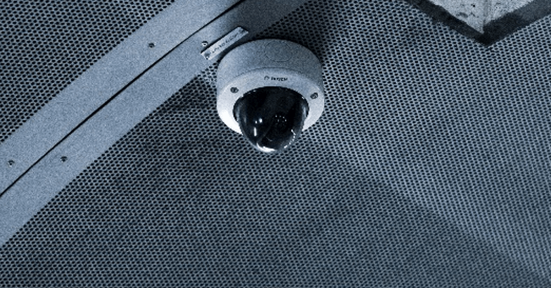 A surveillance camera on the ceiling