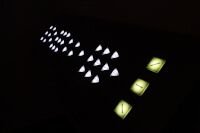 A console with many glowing buttons