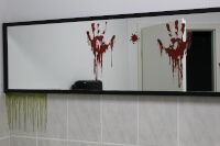 A mirror with attached design elements